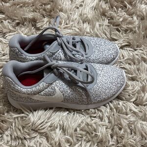 Nike women’s Gray and White Sneakers
